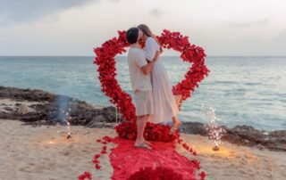 Rose petal heart arch proposal setup facing the ocean in Cozumel