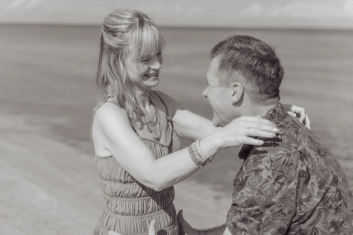 Couple laughing at the shoreline in Cozumel